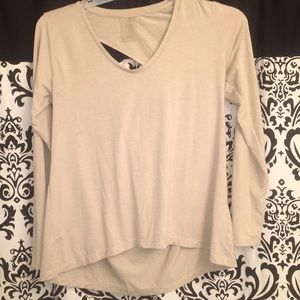 Long sleeve pullover shirt. Size medium. Brand new